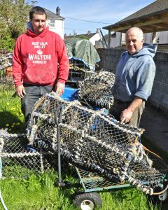 Len Walters and son Aaron each work a boat on potting and scalloping, along with a bit of netting and lining – and the occasional day spent mending pots in the sunshine.