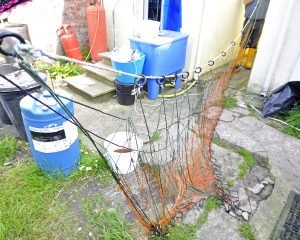 The net has the (orange) 4in mesh, and a larger mesh screen which helps to entangle the fish.