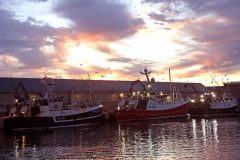 The dawn of a new era for Peterhead, as Jubilee Spirit, Our Lass III and Endurance land whitefish into the new market a few hours before the first sale.