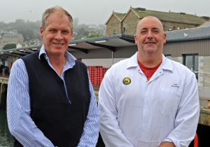 Peter Aylott (left), CEO of Stevenson’s of Newlyn, and the firm’s chief auctioneer, Ian Oliver, give a thumbs-up to the new market at Newlyn.