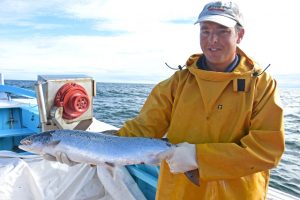 Pride in their work – Shaun holds a superbly conditioned salmon.