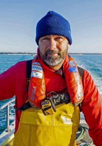 1. Peter Dadds wearing a Mullion Compact 150 lifejacket and an Ocean Signal RescueMe PLB1.