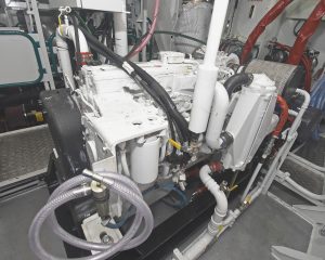 A Cummins QSL9 auxiliary engine drives the main hydraulic system…