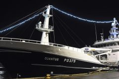 The 65.5m midwater trawler Quantus dressed overall with high-intensity LED lights on the Albert Quay.
