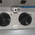 Three power evaporator fans are mounted on the forward bulkhead of the fishroom.