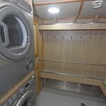 Laundry facilities are built into the heated deck clothing room…