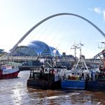 Trawlers berthed on Newcastle quayside, downstream of the iconic Millennium and Tyne bridges.