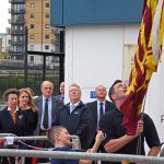 Jonathan Dixon and his son Harvey raise the Royal Standard to welcome HRH The Princess Royal, accompanied by UK Fisheries chief executive Jane Sandell, chairman Sir Barney White-Spunner and Kirkella first mate Charles Waddy.