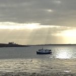 The Orkney creel boat Mary Jean off Helliar Holm in early morning light. (Helen Jones)