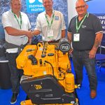 Mermaid double – Boddam skipper Bud Youngman shakes hands with Julian Osborne of Mermaid Marine, watched by Jimmy Anderson of CJ Marine, after buying two J 444 NA engines for installation in his new Savannah 8 static-gear catamaran.