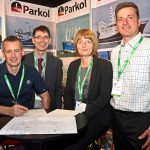 Skipper Robert West signs the contract for Parkol Marine Engineering to build Fruitful Bough at Skipper Expo Int Aberdeen 2018, watched by directors Ian Paton, Sally Atkinson and James Morrison.