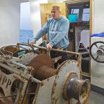 Skipper Luke Noakes running the wires from the Rapp two-barrel trawl winch…