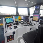 The central steering console in Onward’s wheelhouse.