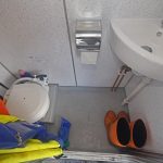 A WC compartment is incorporated into the extended port side of the wheelhouse.