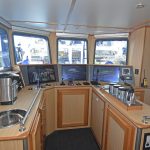 The fishing console is arranged in the starboard aft corner of the wheelhouse.