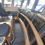 Fishing and navigation information is displayed through a matrix-operated system on the 24in wide screens flush-mounted over two levels in the main forward console.
