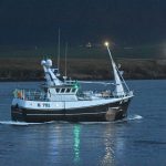 Carvela passing Hoy in low light, at the start of another weekly trip crabbing to the west of Orkney.