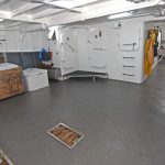 The deckhouse is positioned at the starboard quarter of the main deck.