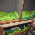 … is arranged forward of three bunks positioned under the wheelhouse floor.