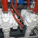 … through two Kawasaki load-sensing hydraulic pumps.