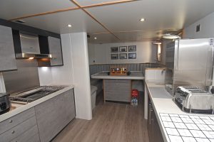 Two views of the stylish galley…
