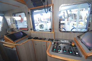 The central trawl console provides a clear view of activity across the transom.