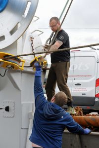 Skipper Carl Snell and crewman Reegan Green making adjustments to the Flemings Fairleads blocks, made by F&R Belbin Ltd.