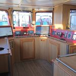 The fishing console is arranged in the aft starboard corner of the wheelhouse.