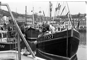 The Blejan Eyhre berthed at its home port of Mevagissey in 1984. Built at J Moor & Son and launched in 1978, it was the last fishing boat of traditional lines built at the yard.