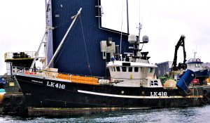Endurance taking ice at Lerwick before leaving to fish her first trip. (Photo: Sydney Sinclair)