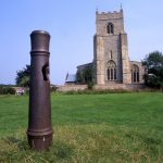 Wiveton has one, too, stood up on a small mound in front of the church. The story goes that it was fired in celebration at a wedding and burst, killing the groom. But that may be just a story.