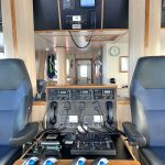 The Navitron autopilot and VHF sets are built into the central island console.