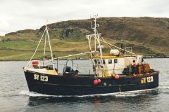 The versatile Dunan Star II heads into the pier at Carloway in East Loch Roag, Lewis.