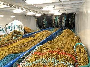 Three nets are hauled along the full-length trawl deck by three sets of split sweepline winches…