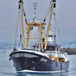 Bow view of Georgina of Ladram, showing the beamer’s modern appearance and striking lines. (Photo: Alan Letcher)