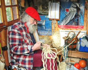 Des Pawson does knots – which, here in his workshop, make a boat fender...